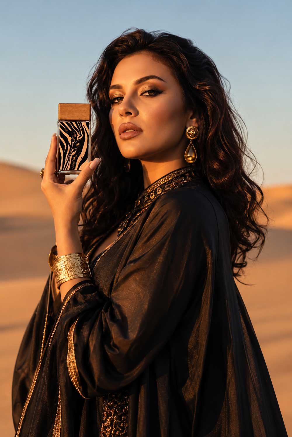 A client holding her personal JEE fragrance